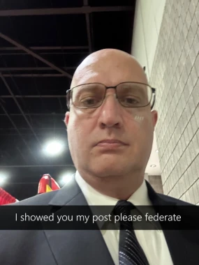 A selfie of Jerry Bell with the caption "I showed you my post please federate".