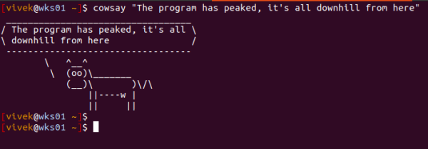 Cowsay generates an ASCII picture of a cow saying something provided by the  user. In this example, it says "The program has peaked, it's all downhill from here"