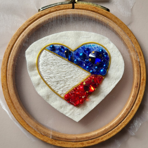 philippine flag in the shape of a heart made with beads
