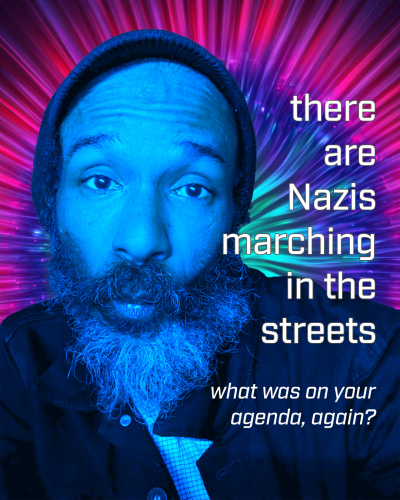 Selfie with blue light filter and text: "There are Nazis marching in the streets; what was on your agenda again?"