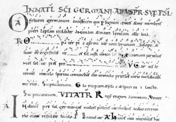 Ten lines of minuscule Latin text with musical notes written above.